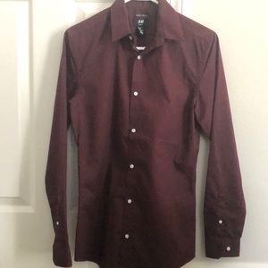 Maroon button down long sleeve dress shirt.